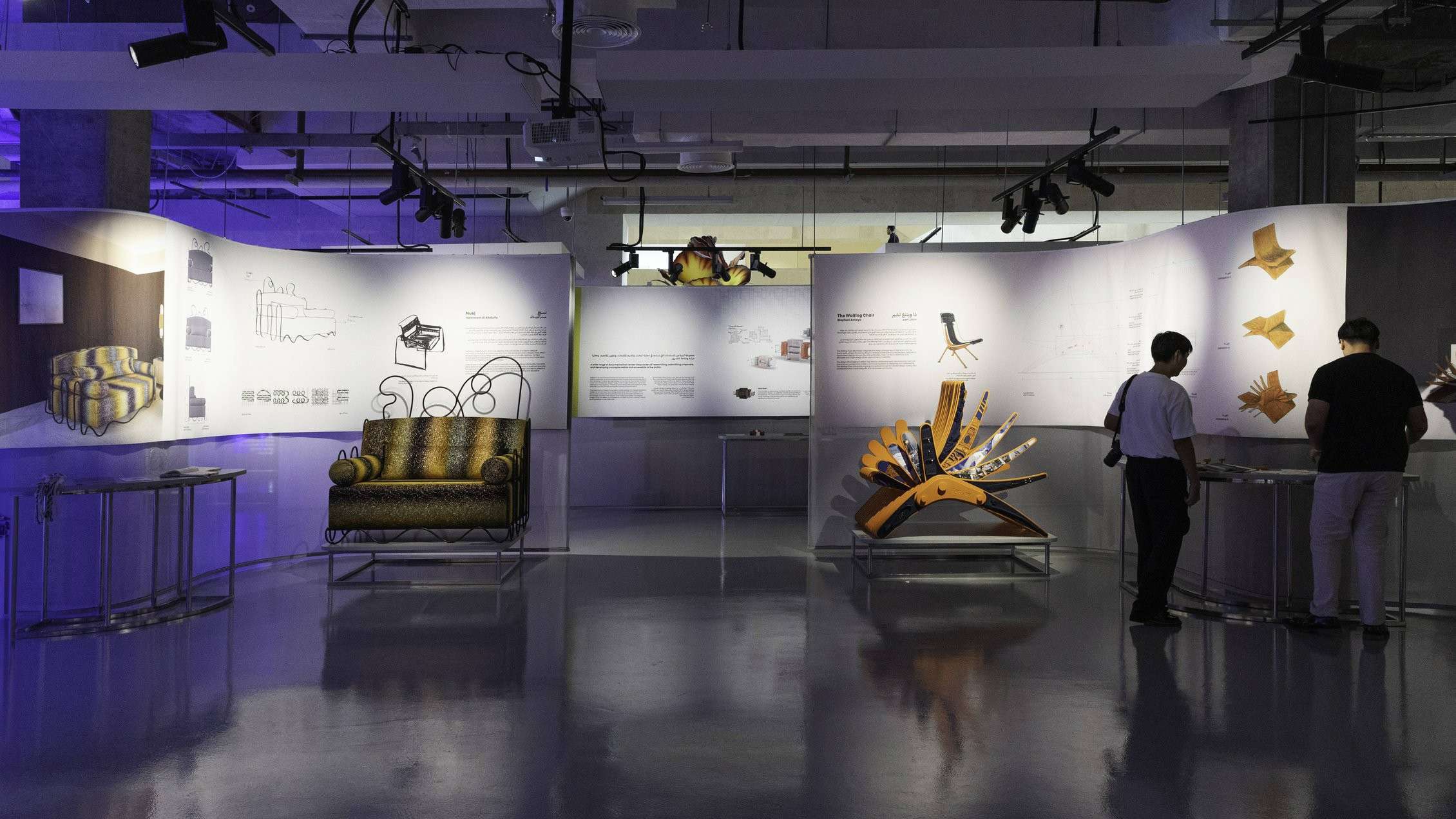 Art exhibition M7 Msheireb Downtown featuring unique furniture designs, with a sofa and a vibrant wooden chair on display